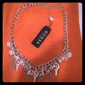 Silver charm necklace by guess